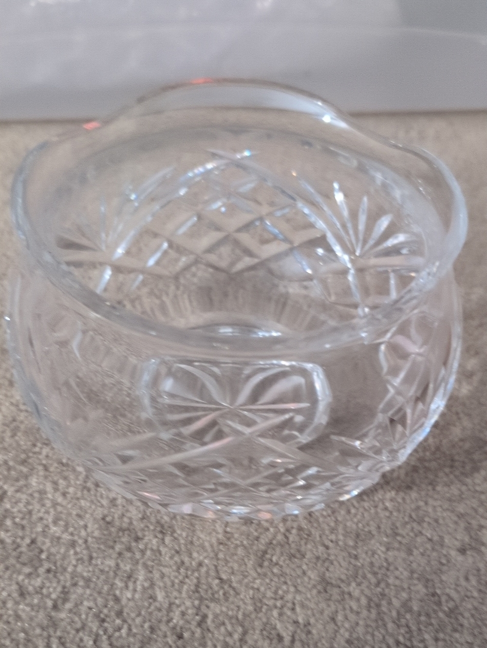 vintage cut crystal rose bowl featuring a diamond and fan pattern.